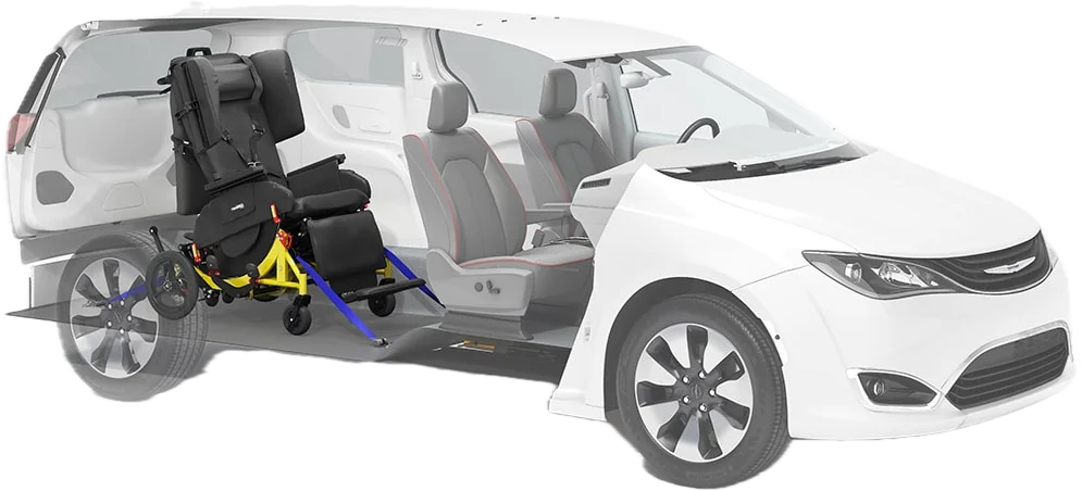 Cutaway of an accessible minivan showing the transport chair anchored to the floor with four-point tie-down straps